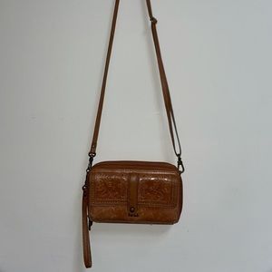 The Sak spacious multi purpose side bag/wristlet.